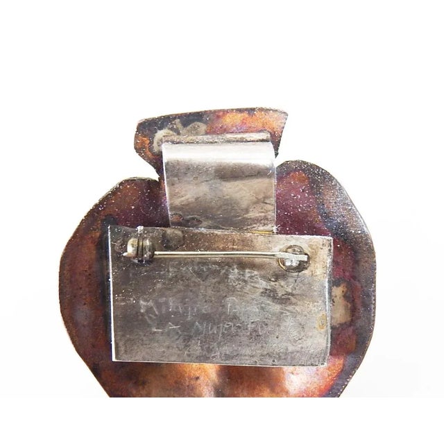 1995 copper, silver and pink coral cameo pendant or brooch by Alejandro Sifuentes (20th/21st century) Texas. Signed, dated...