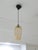 This amber blown glass pendant light is a beautiful example of minimalist retro lighting, featuring a softly rounded,...