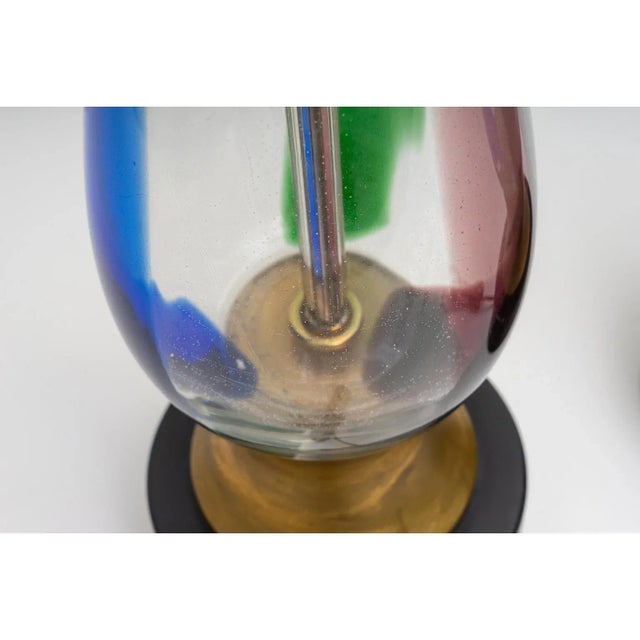 This stylish and chic pair of Seguso Murano glass table lamps date to the 1970s and were fabricated for Marbro Lamps....