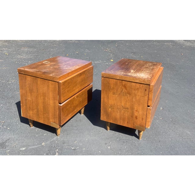 This pair of vintage mid-century modern nightstands by Bassett Furniture Industries perfectly captures the clean,...