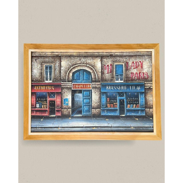 Hand painted original impasto oil painting depicting a Parisian storefront scene. The painting shows lovely detail of a...