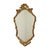 Mid-century Deknudt mirror in a classic wooden frame gilded with gold leaf, entirely in Baroque style; the design is...