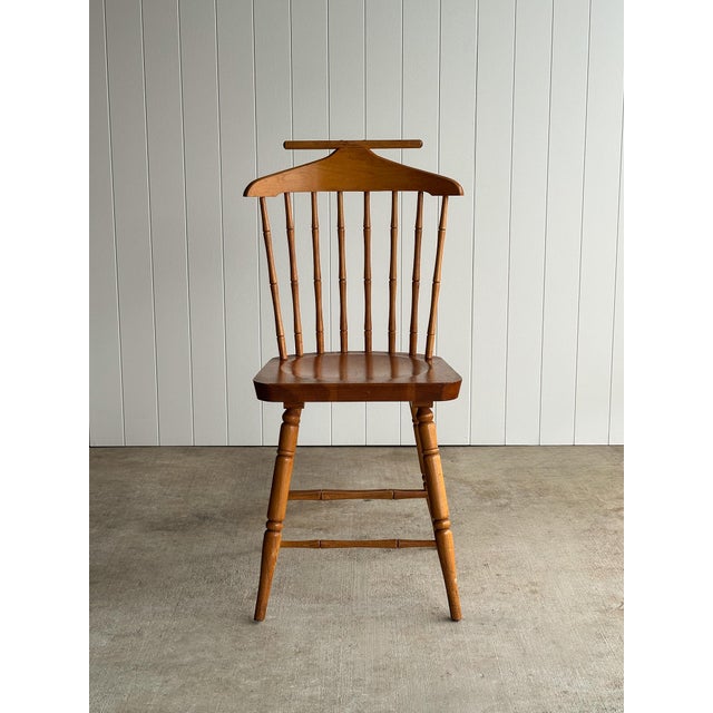 Vintage windsor-back valet chair with faux bamboo spindles, turned legs, and integrated valet bar. Light vintage wear. C....