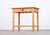 Striking Danish brutalist oak side table from the 1960s, featuring a sculptural design in the style of Henning Kjærnulf....
