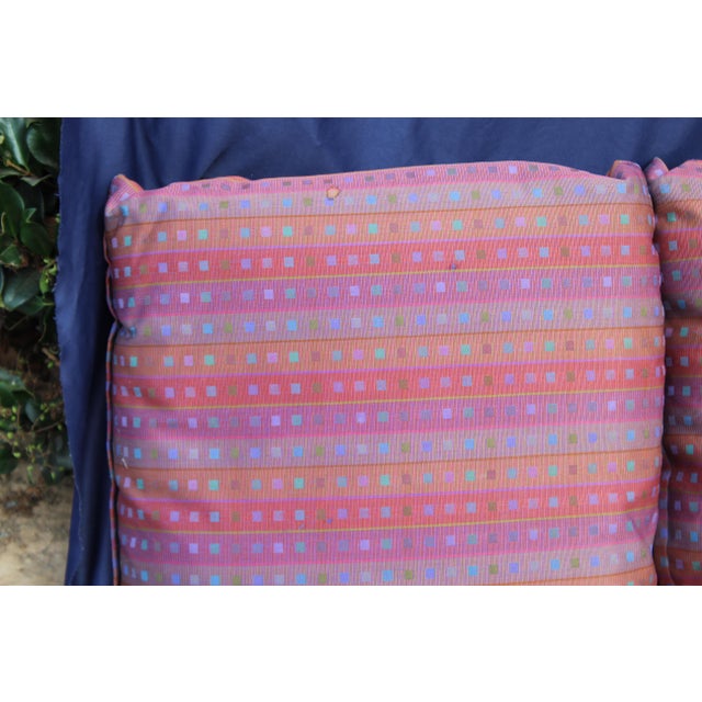 This is a pair of 1980s down filled pillows.