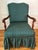 Regency style carved mahogany armchair upholstered and skirted in a dark forest green striped upholstery fabric. Solid and...
