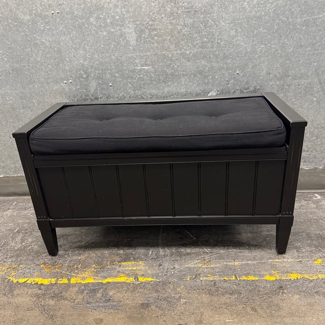 Design Plus Gallery presents the Ebony Morrison Storage Bench from Crate & Barrel. The design has vertical paneling, a...