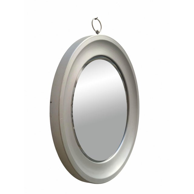 An iconic circular wall mirror designed by the renowned Italian designer Sergio Mazza (co-founder of Artemide alongside...