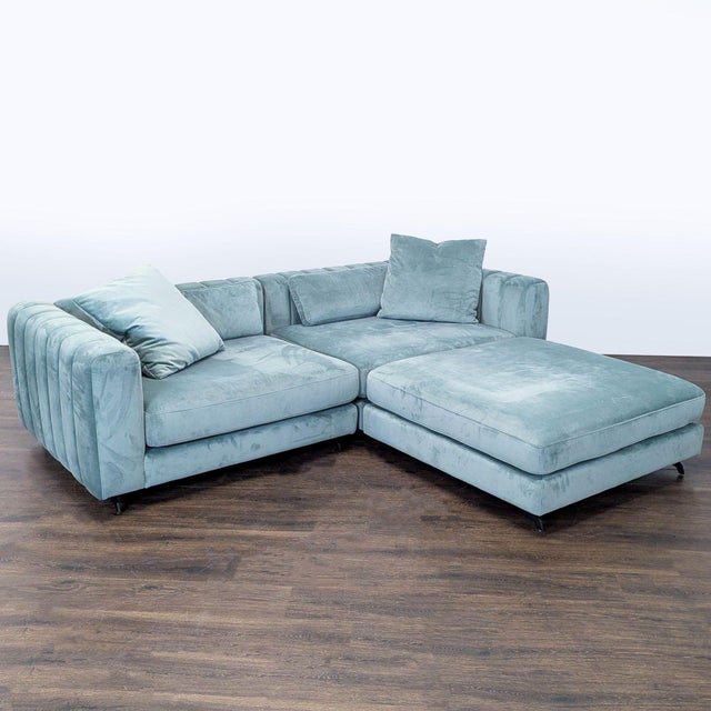 This Rove Concepts sectional offers roomy seating with a stylish light blue velvet finish. Includes matching cushions and...