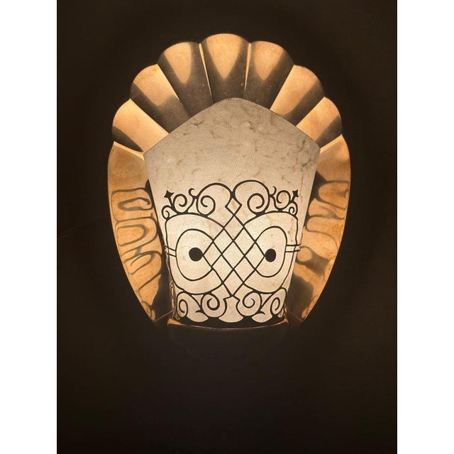 This pair of luxury lamps from the 1920s to 1930s is truly one-of-a-kind. The back plate was lovingly cast in the shape of...