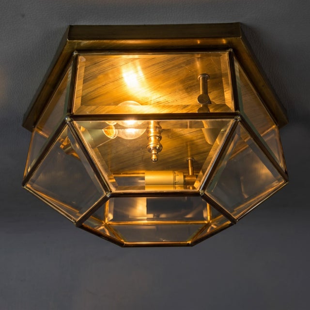 A refined hexagonal lantern ceiling light, attributed to Italian craftsmanship from the 1970s. Subject and Style: Rigorous...