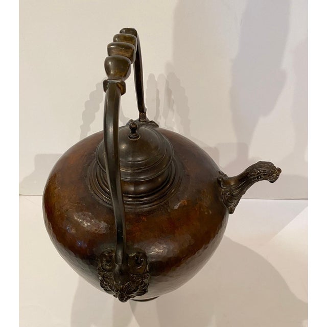 Hand pounded copper ewer with bronze spout, handle and top. From the area of Florence, Italy, circa 1800.