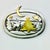 A lovely Christmas Brooch from Janette Jewelry out of Rhode Island from the 1980s. It features a silver metal oval with...