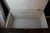 This superb Louis Vuitton travel trunk is distinguished by its hand-stenciled Monogram canvas, honey-colored "lozine"...