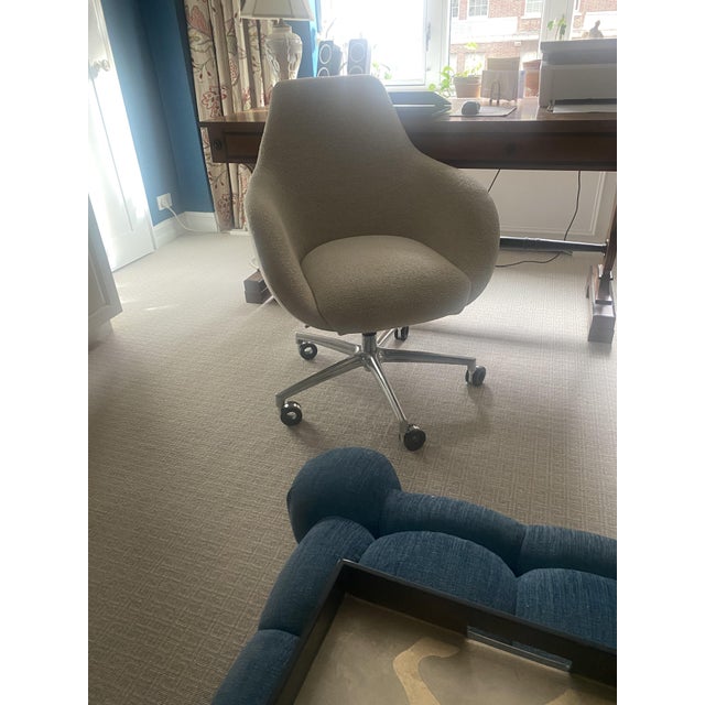 This is a very comfortable wraparound upholstered arm desk chair from Roche Bobois. It is in excellent condition as it has...