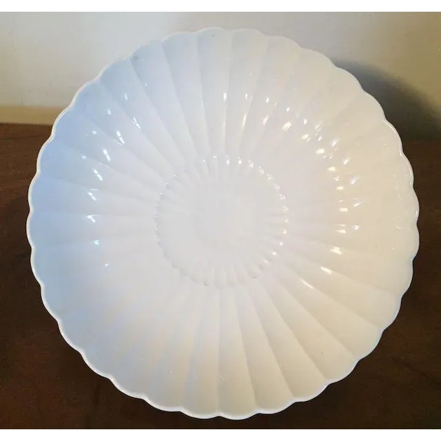 Antique 19th c. Chinese white porcelain bowl in the form of a flower with ruffled edge. Measures 9 7/8" diameter x 2 5/8"...