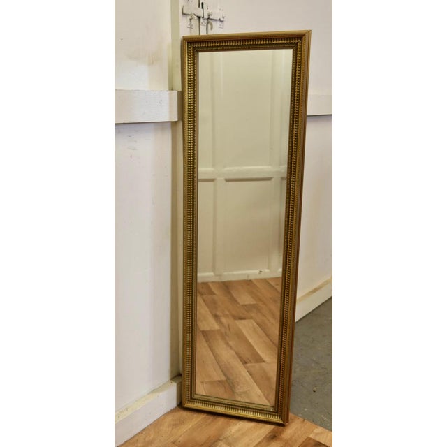 A Decorative Long Gilt/Green Dressing Mirror. A delightful piece, the mirror has a 2” wide Gilt frame in gold over a green...