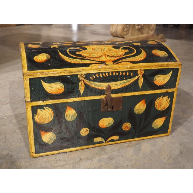 More information coming soon… This small trunk from Normandy, France, is adorned with beautiful polychrome floral decor...