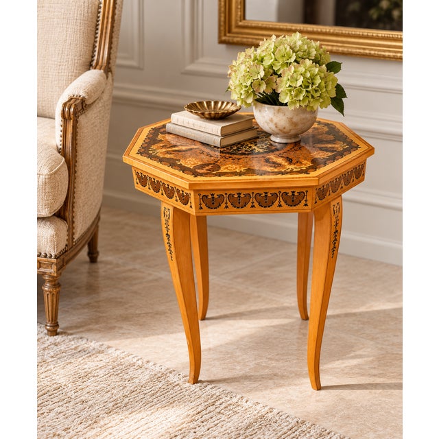A charming vintage Italian octagonal side table featuring exceptionally detailed marquetry and inlaid decoration...