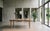 Oval Brutalist dining table designed by Henning Kjærnulf and produced in Denmark during the 1960s. Crafted in oak, the...