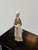Design Plus Gallery presents a Porcelain Figurine of a Girl Carrying Ducklines from the Carl Scheidig Factory (1906–1972)...