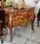 A true masterpiece of French-inspired luxury, this stunning Louis XV Bombe Commode showcases an elegant serpentine...
