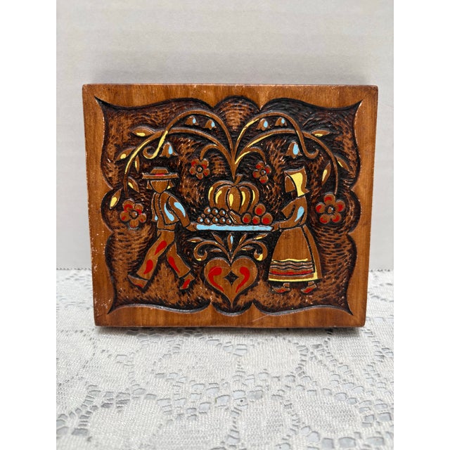 Vintage iconic 1962 ceramic Dutch wall accent with whimsical design, characters and flowers.