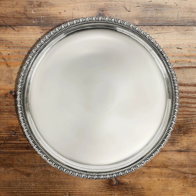 A wonderful and substantial 19th century English silver-plate butler's tray with a heavy egg and dart patterned rim....