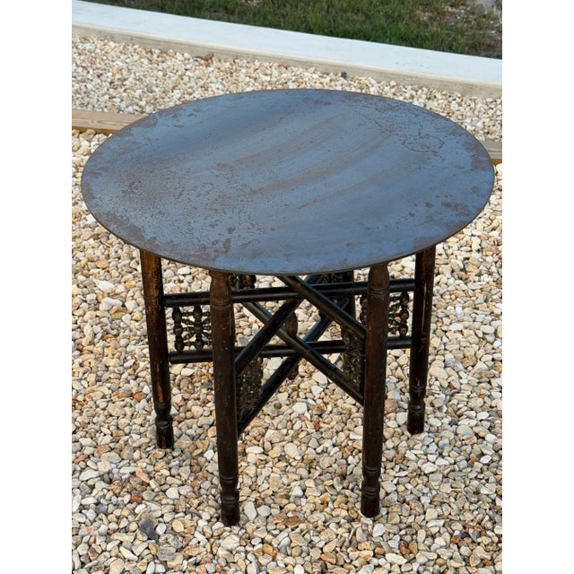 Industrial Moroccan Side Table With Round Raw Steel Top + Weathered Folding Base For Sale - Image 6 of 16
