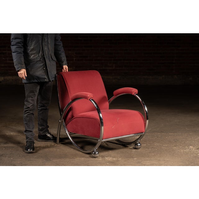 Modern lounge chair produced by Opus21, designed after Kem Weber, reflecting the streamlined modernist vocabulary...