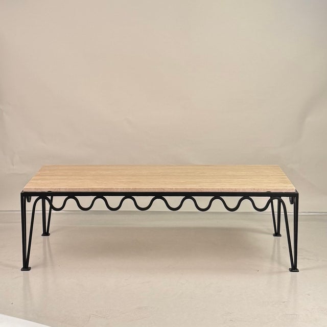 Design Frères 'Méandre' undulating travertine table in coffee table size.