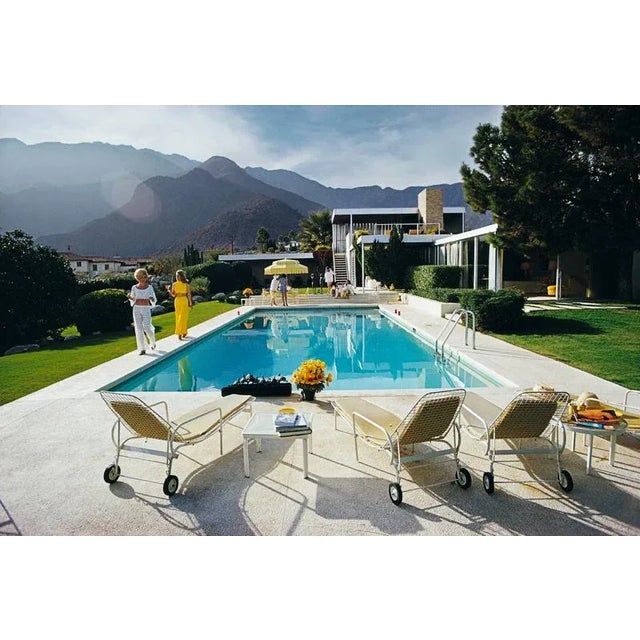 Poolside Catwalk 1970 Former fashion model Helen Dzo Dzo Kaptur (in white lace) and Nelda Linsk (in yellow), wife of art...