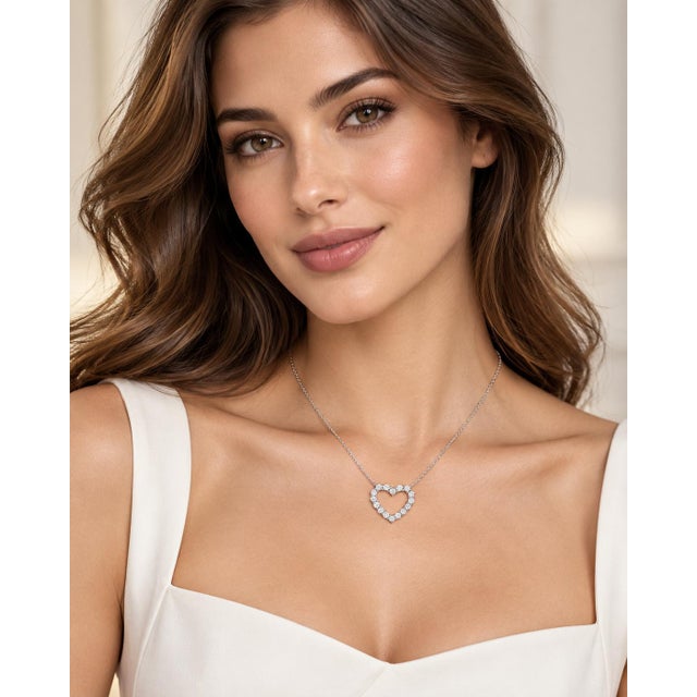 A romantic emblem of modern sparkle and pure elegance, this radiant pendant necklace is crafted in solid 14K white gold....