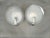 Elegant pair of art deco wall lights produced in czechoslovakia during the 1940s featuring circular frosted glass shades...