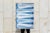 "Wavy Stripes" is a minimalist cyanotype monotype presents a quiet study of rhythm and balance through softly undulating...