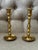Pair of vintage brass candlestick with a classic turned design and warm golden patina. Each candlestick features a wide,...
