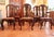 A remarkable set of antique Rococo carved walnut dining chairs, designed with bold curves and great details. Cabriole legs...