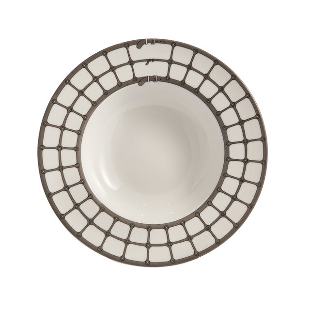 Crafted from fine porcelain, this set of four Aryan Soup Plates draws inspiration from the tailored detailing of the...