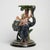 Standout 19th Century majolica pedestal handcrafted in terra cotta. In an orientalist theme with a woman and an ostrich...