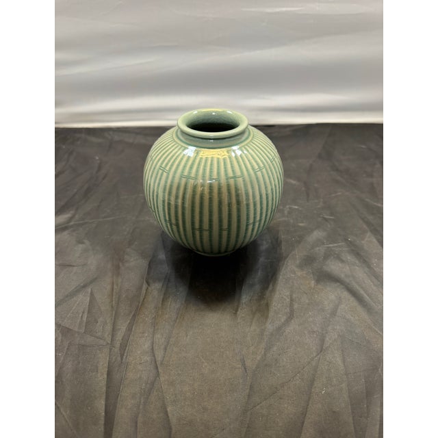 This vintage signed Korean Celadon Ribbed Bamboo Vase by artist Song-cheong 松青 features a unique crackle glaze and Asian...