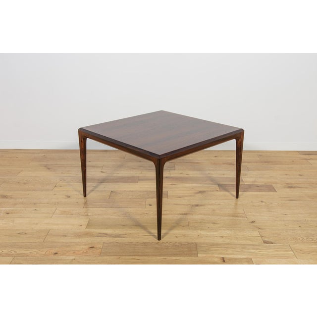 This coffee table was designed by Johannes Andersen and manufactured by CFC Silkeborg in the 1960s in Denmark. A table...