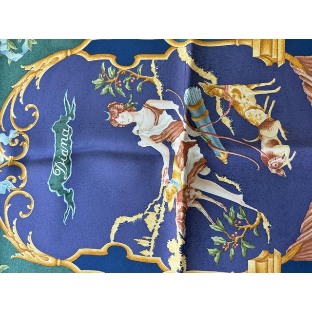 Rare vintage Gucci silk scarf featuring Diana, the Roman goddess of the hunt and wilderness. Navy, hunter green, and deep...