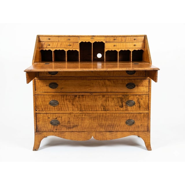 A real handcrafted gem, this early 1700's tiger maple secretary is a rare surviving example of early American...