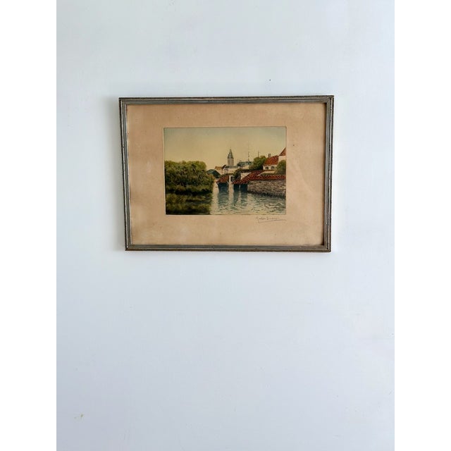 Signed early 20th-century etching by martin gradier, depicting a picturesque european village landscape with stone...