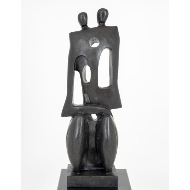 Contemporary Abstract Figures Marble Sculpture, on rectangular marble base, unsigned, mounted on black pedestal....