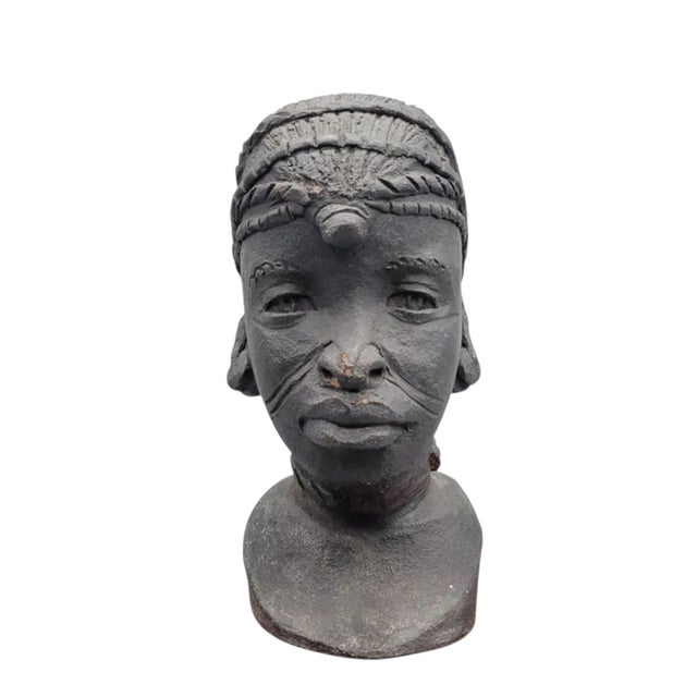 Beautiful Blackened Red Clay Sculpture Signed by Flora Busia. Striking and Lifelike, this Clay Bust of Maasai Woman...