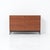 A timeless 1960s cabinet by Pierre Guariche for Meurop, featuring a teak veneer and metal handles. Meurop helped bring...