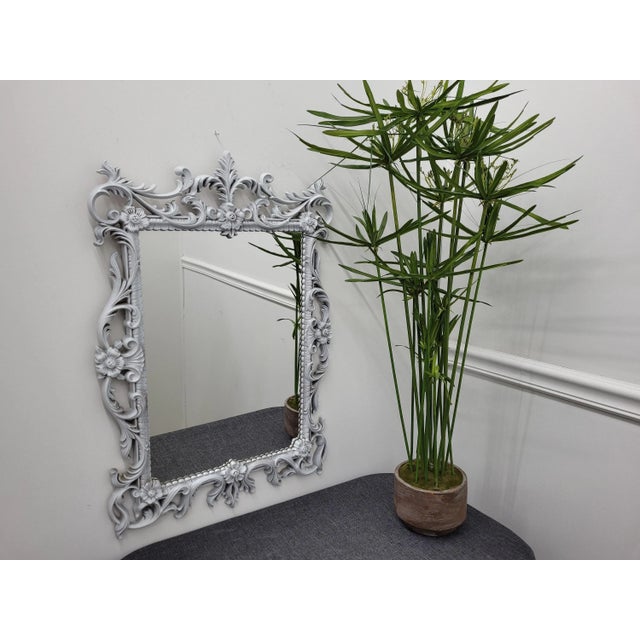 Beautiful Vintage Mirror has been painted white over the gold original finish. Very nice details that will sure demand the...