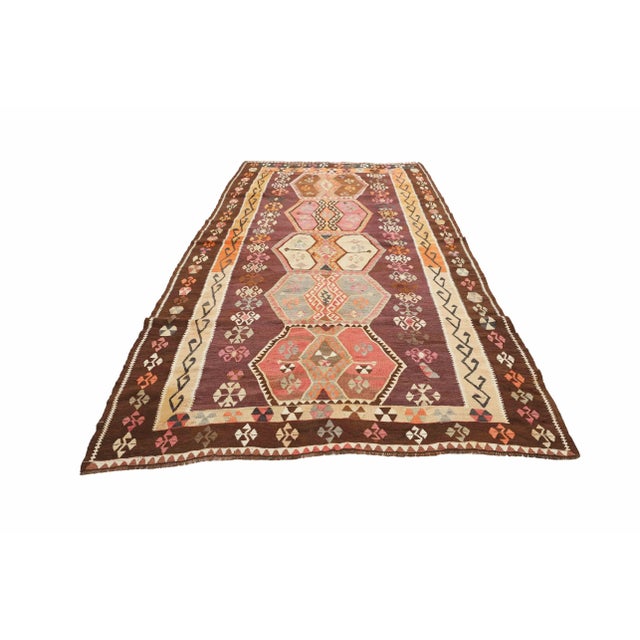 Vintage handwoven decorative kilim rug from Kars region of Tukey. Approximately 50-60 years old. In very good condition.