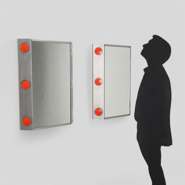 Bathroom furniture in chromed aluminum and colored plastic inserts, internal glass shelves. This piece is attributed to...